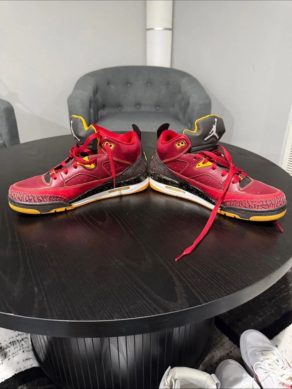 Jordan Men's Red and Black Mid-Top Sneakers with Yellow Accents